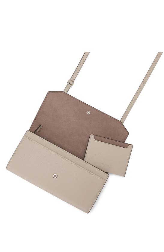 Shop Oryany Mandy Leather Crossbody Wallet In Cream