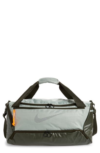 Click to view more detailed imagery on our partner's website Nike Brasilia Duffle Bag In Jade/ Sequoia/ Reflect