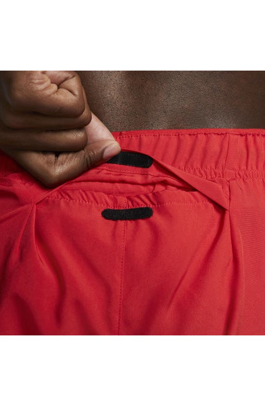 Shop Nike Dri-fit Challenger Athletic Shorts In University Red/ Black