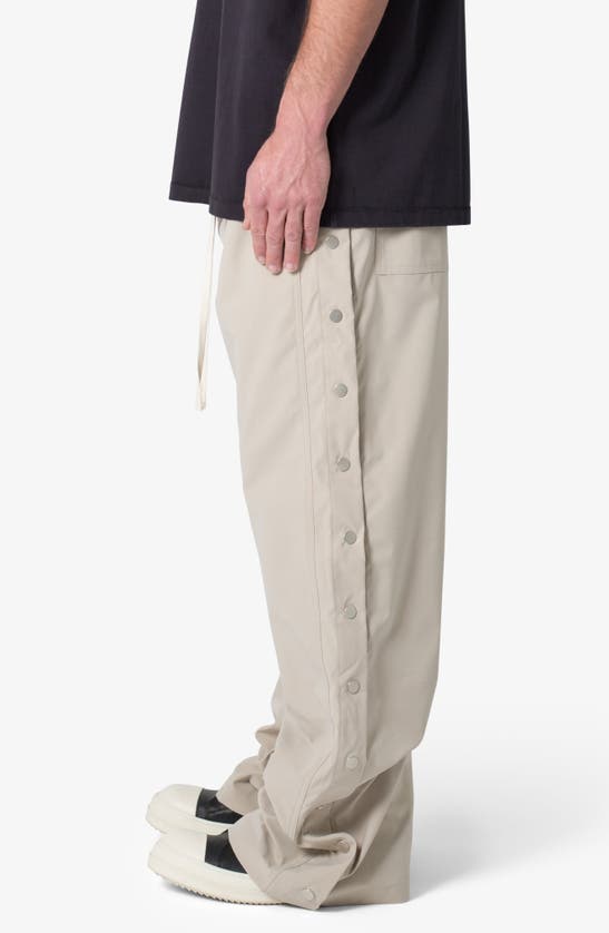 Shop Mnml Oversize Side Snap Nylon Pants In Tan