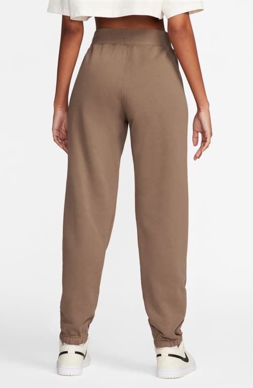 Shop Jordan Flight Fleece Sweatpants In Archaeo Brown