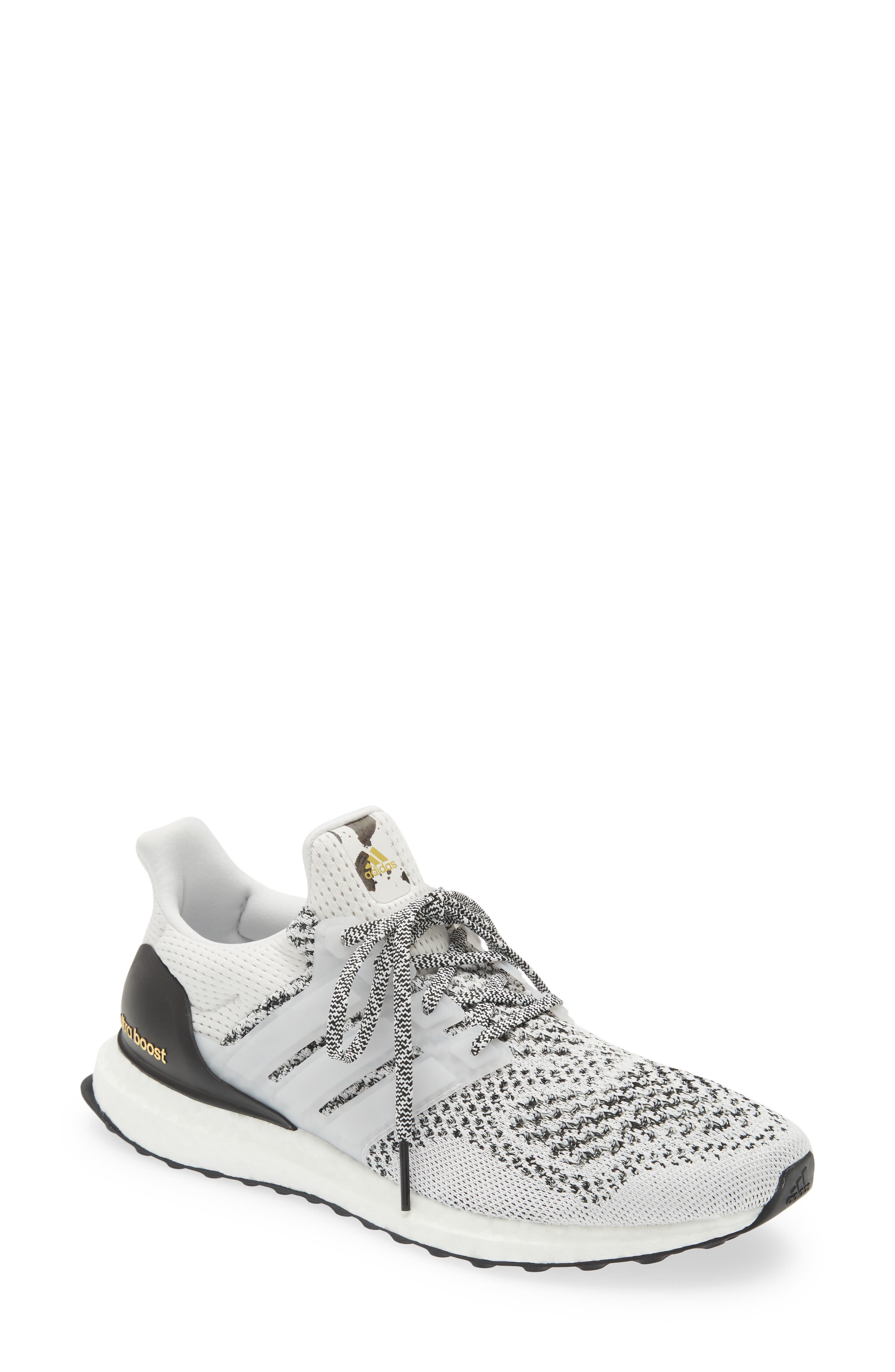 grey and white adidas running shoes