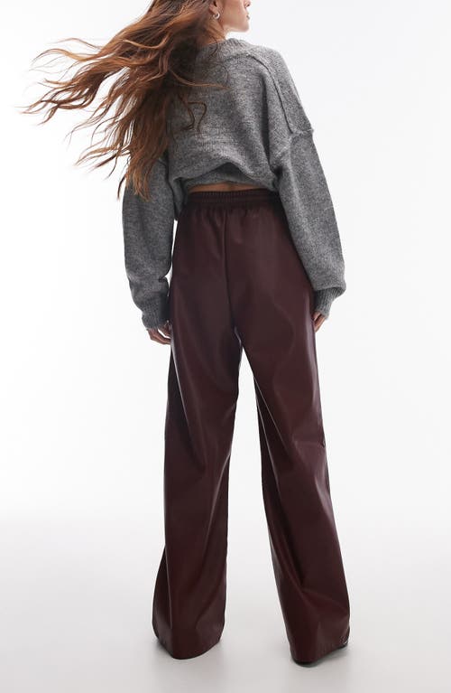 Shop Topshop Faux Leather Wide Leg Drawstring Pants In Burgundy