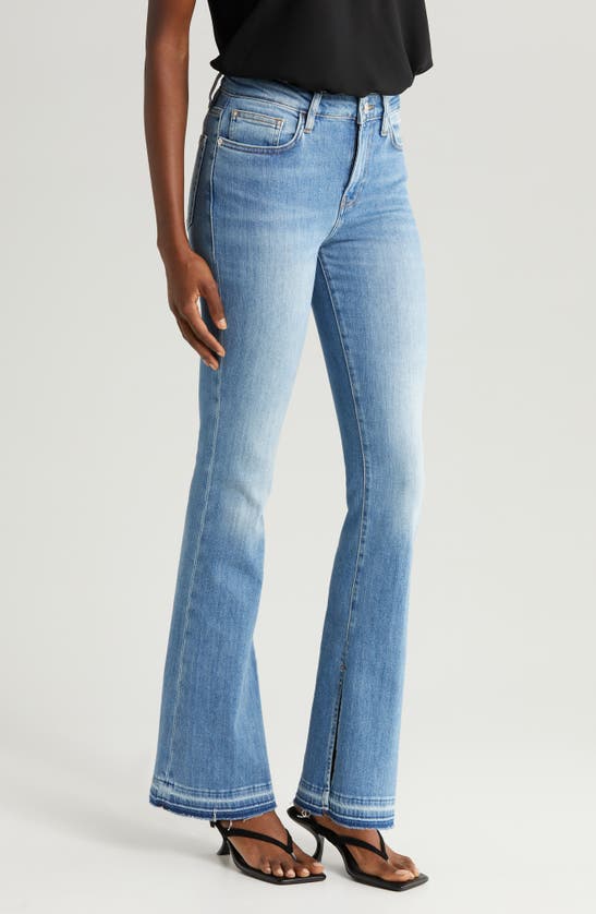 Shop Frame Le Mini Bootcut Jeans In Wavey