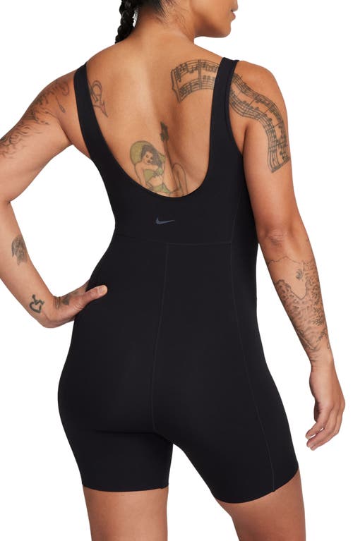 Shop Nike Infinasoft Essentials Dri-fit Romper In Black/pcg6c