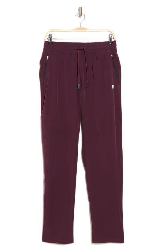 Shop Russell Athletic Tech Athletic Pants In Merlot