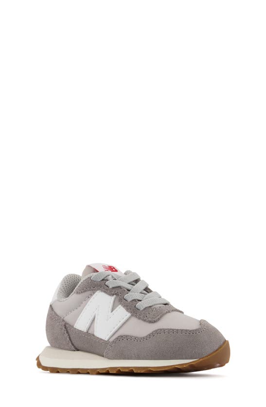 Shop New Balance Kids' 237 Sneaker In Grey