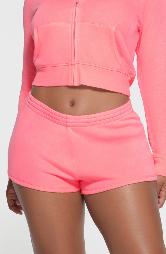 Shop Skims Light French Terry Loose Shorts In Coral