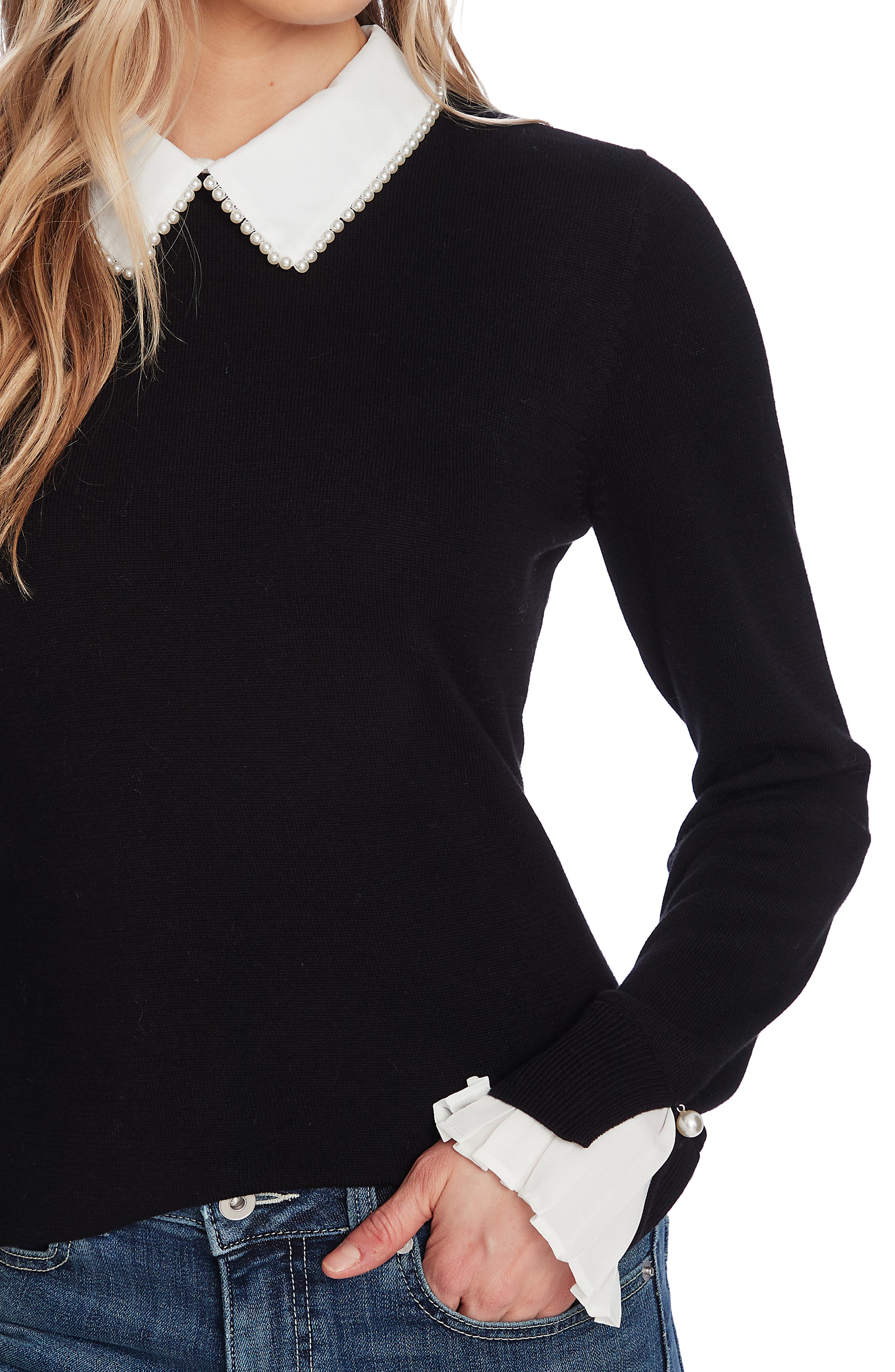 black sweater with pearl collar