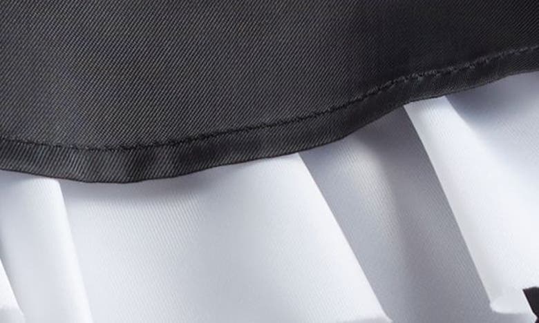 Shop Noir Kei Ninomiya Reversible Colorblock Tiered Ruffle Top In Black X White