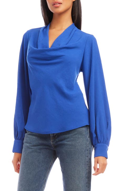 A simple cobalt blue blouse with elbow sleeves and a line of potli buttons  embellishing the back. To place your orders please WhatsApp