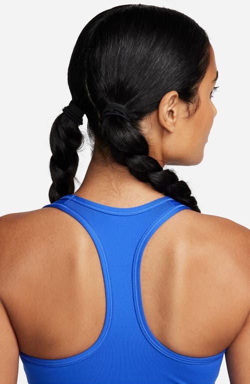 Shop Nike Dri-fit Padded Sports Bra In Hyper Royal/black