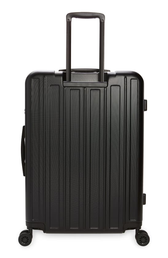 Shop Calpak Wandr 28" Hardside Expandable Spinner Suitcase In Black