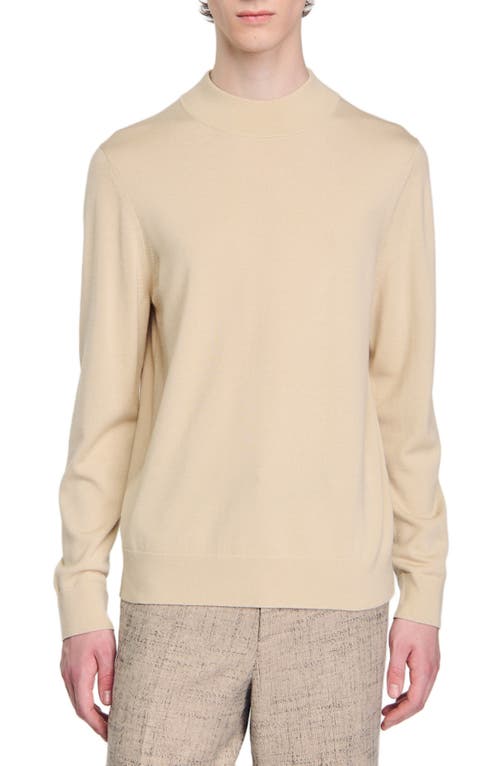 Shop Sandro Funnel Neck Sweater In Cream