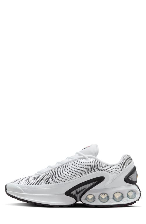 Shop Nike Air Max Dn Sneaker In White/black/photon Dust