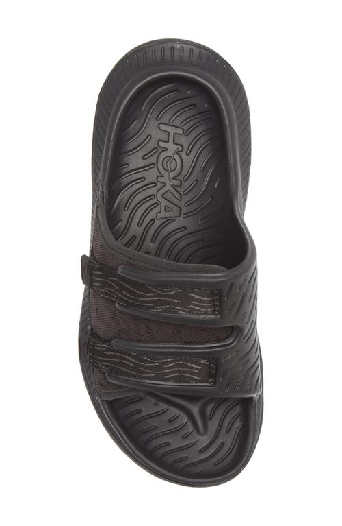 Shop Hoka Gender Inclusive Ora Luxe Slide Sandal In Black/black