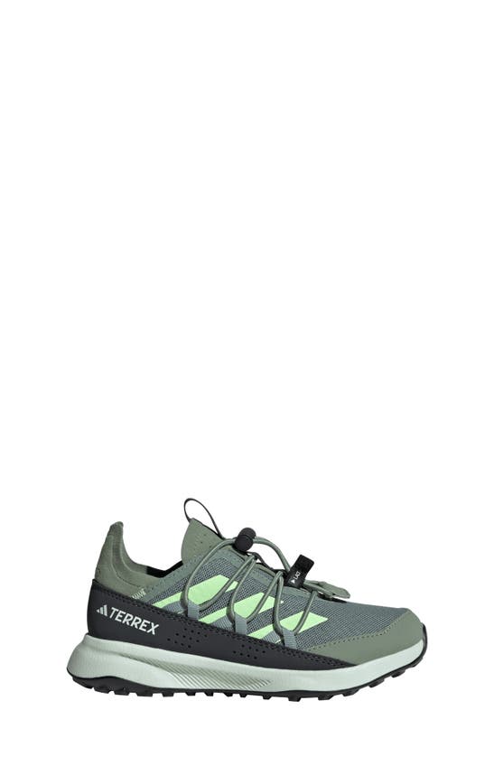 Shop Adidas Originals Kids' Terrex Voyager 21 Canvas Running Shoe In Silver/ Green/ Crystal Jade