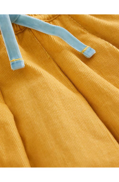 Shop Mini Boden Kids' Twirly Pleated Cotton Skirt In Vintage Yellow Cord