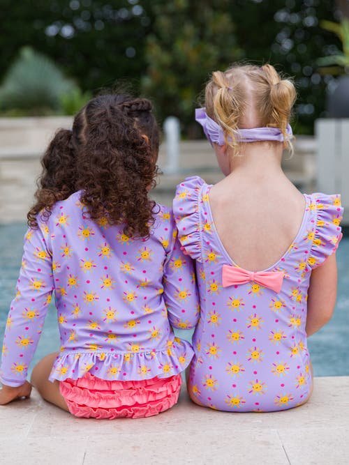 Shop Rufflebutts Girls Upf50+  Waterfall One Piece In Lavender Sunshiny Day