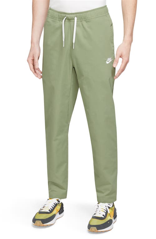 Nike Woven Tapered Leg Pants In Oil Green/white