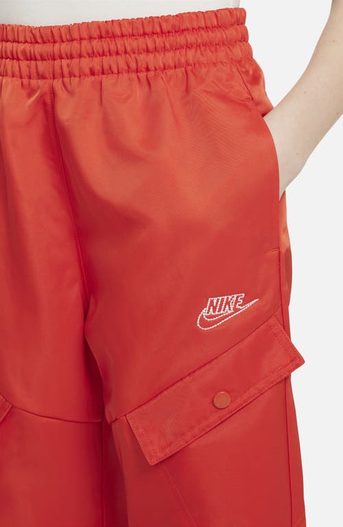 Shop Nike Kids' Sportswear Water Repellent Cargo Pants In Picante Red/white