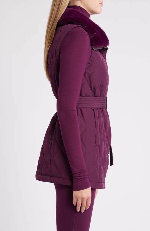 Shop Anne Klein Belted Zip Front Quilted Vest With Faux Fur Collar In Deep Plum