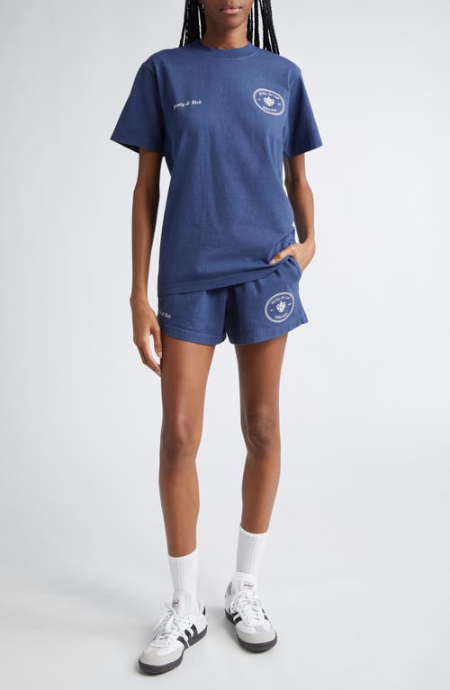 Shop Sporty And Rich Sporty & Rich Eden Crest Cotton Disco Shorts In Indigo