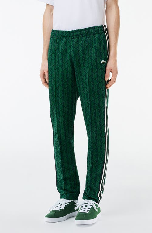 Lacoste Printed Tracksuit Pants In Marine/oseille