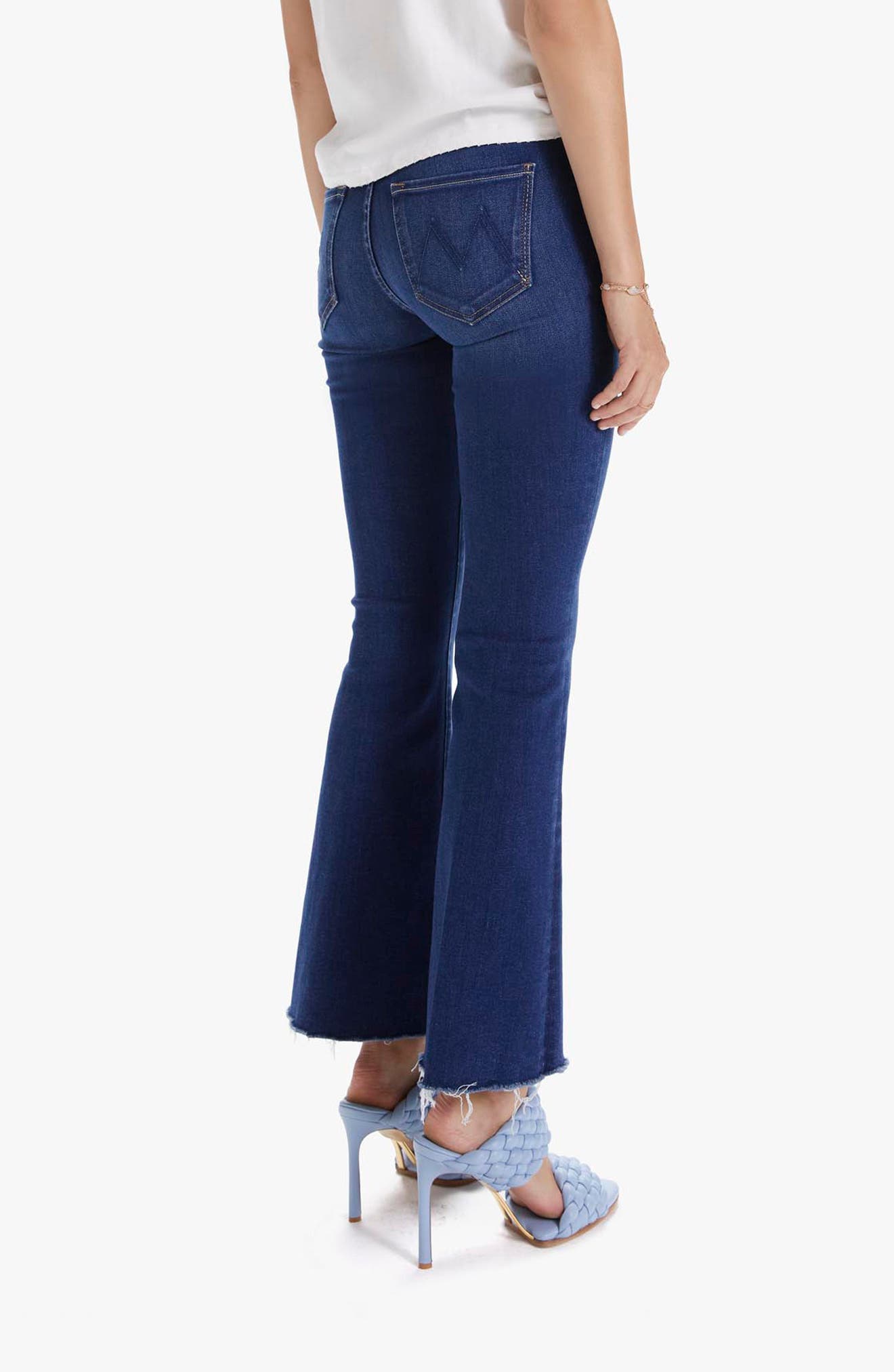 mother frayed flare jeans