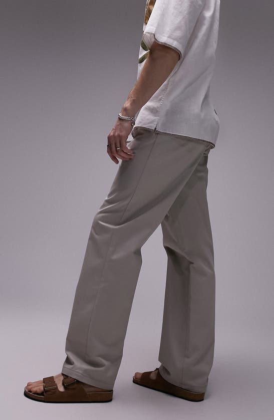 Shop Topman Relaxed Fit Straight Leg Pants In Stone
