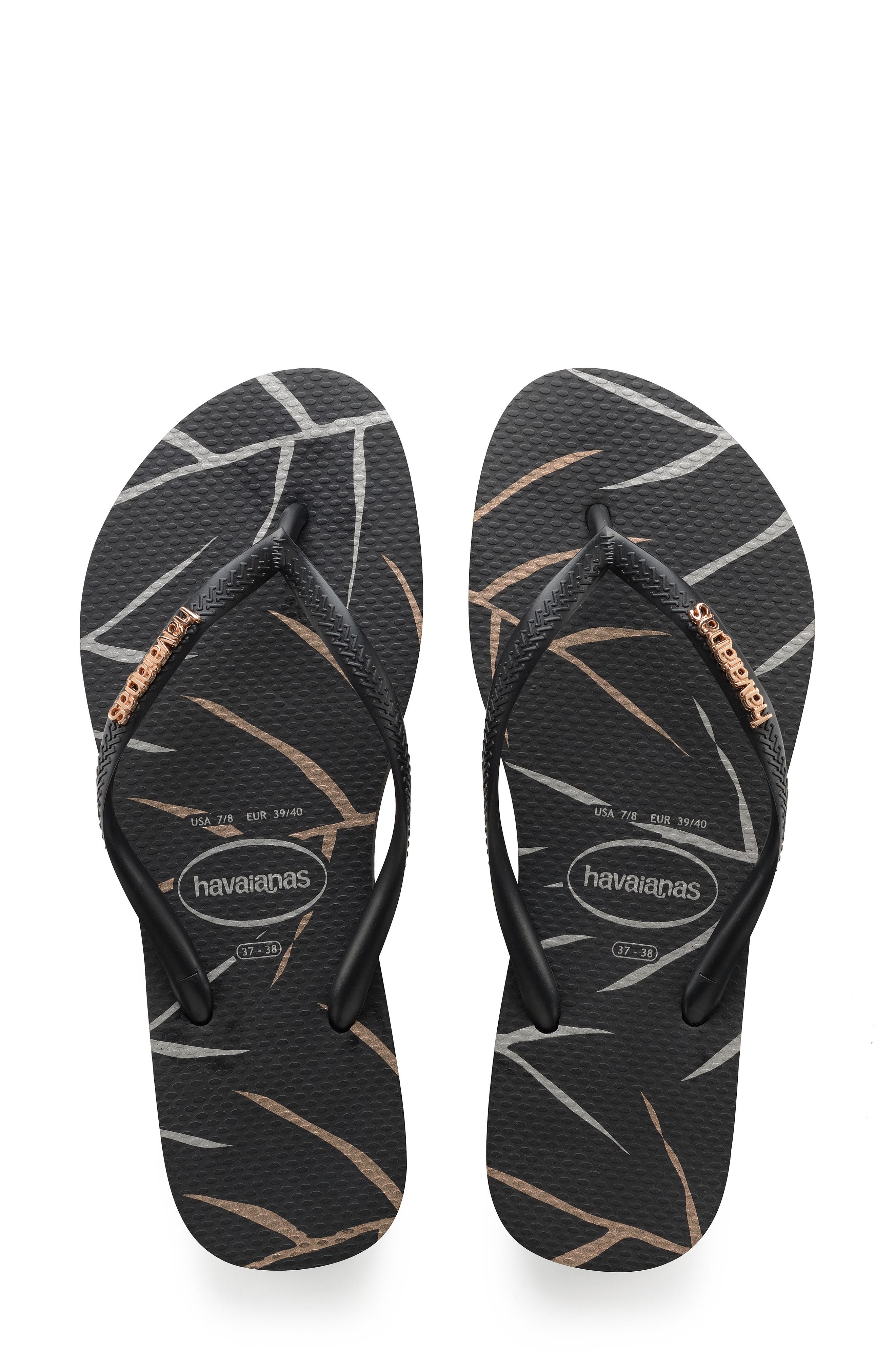 olukai flip flops leather