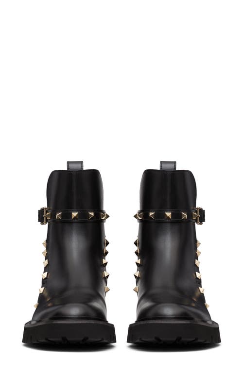 Shop Valentino Garavani Rockstud Combat Boot In Nero/gold