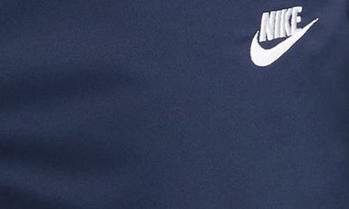 Shop Nike Woven Tapered Leg Pants In Midnight Navy/white