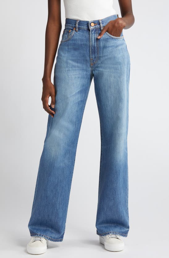 Shop Purple Brand Coated Wide Leg Jeans In Mid Indigo