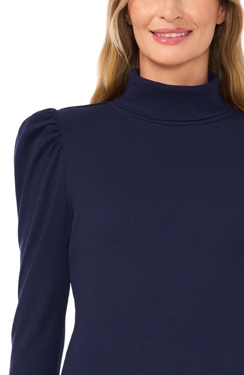 Shop Cece Gathered Sleeve Turtleneck Top In Classic Navy Blue