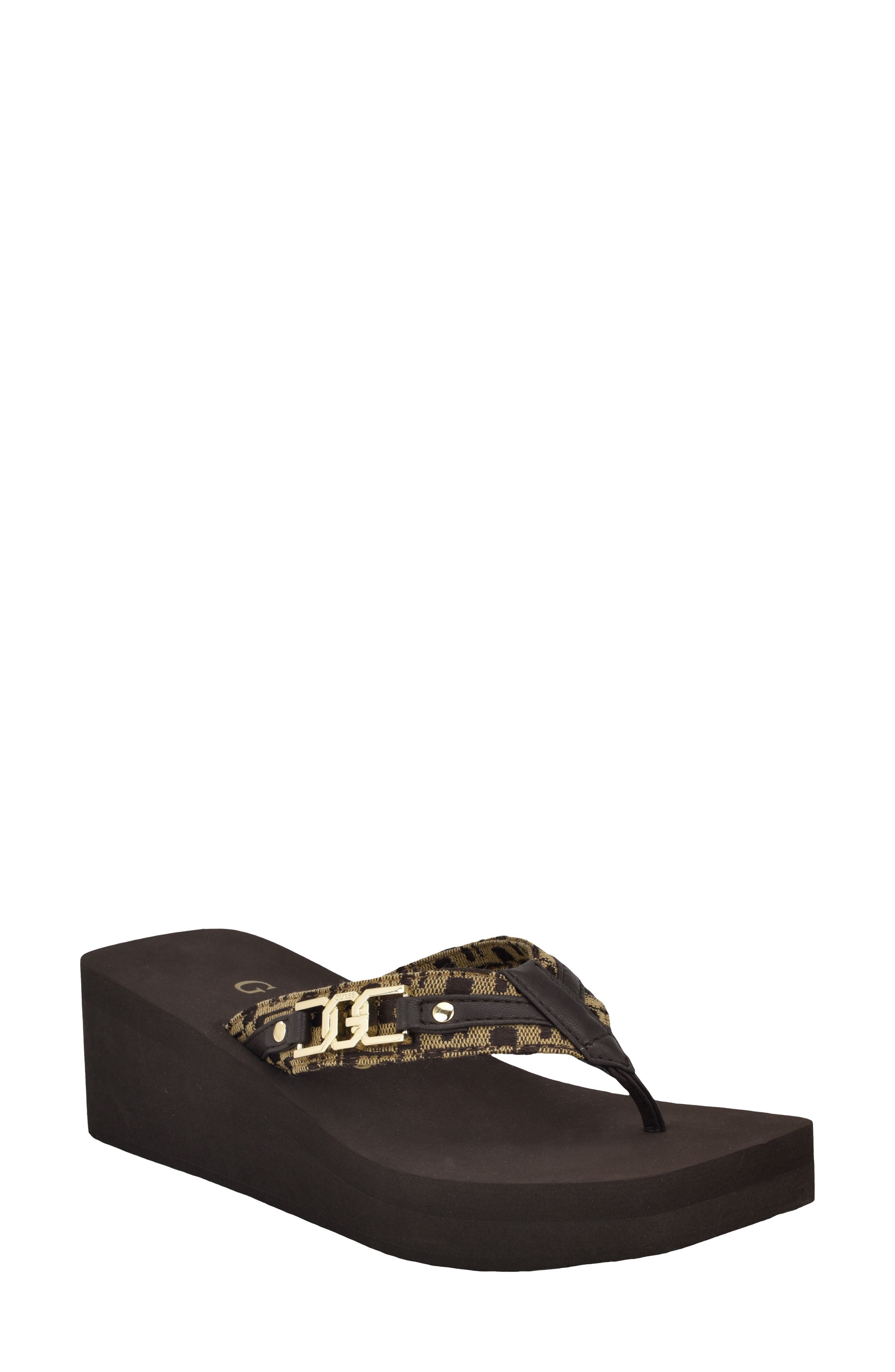 Guess black wedge hot sale flip flops