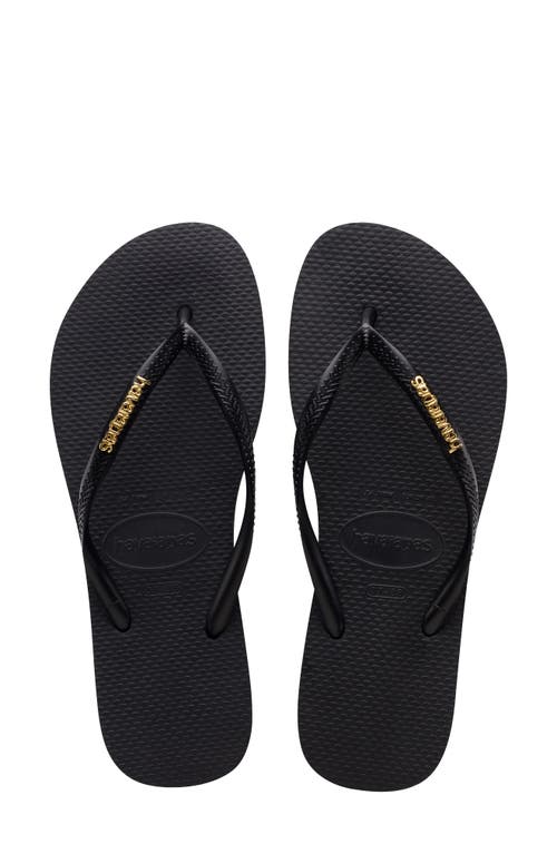 Shop Havaianas Slim Logo Metallic Flip Flop In Black/golden