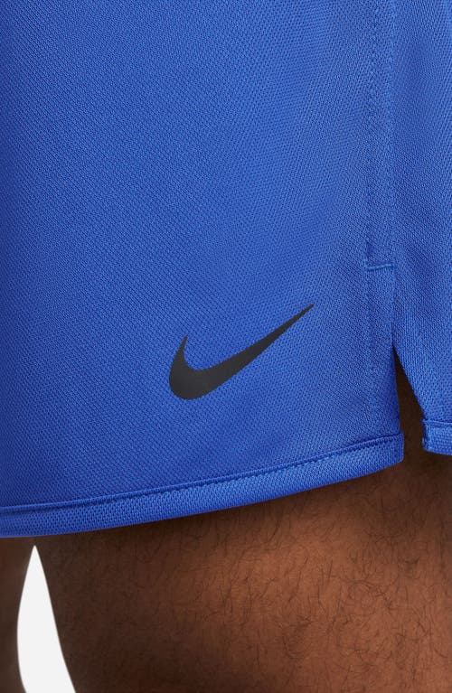 Shop Nike Dri-fit 7-inch Brief Lined Versatile Shorts In Game Royal/black
