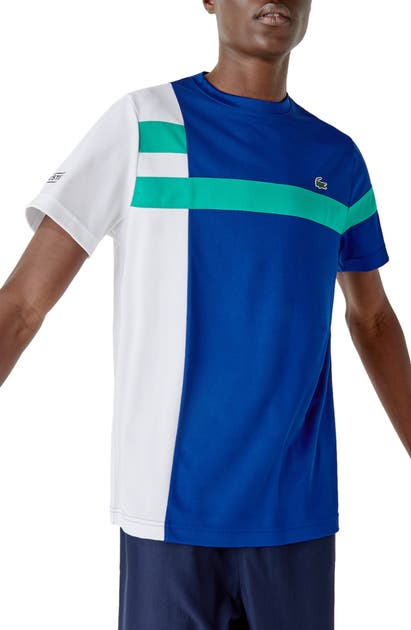 Click to view more detailed imagery on our partner's website Lacoste Men's Sport Colorblock Breathable Piqué Tennis T-shirt In Cosmic/ White Greenfinch