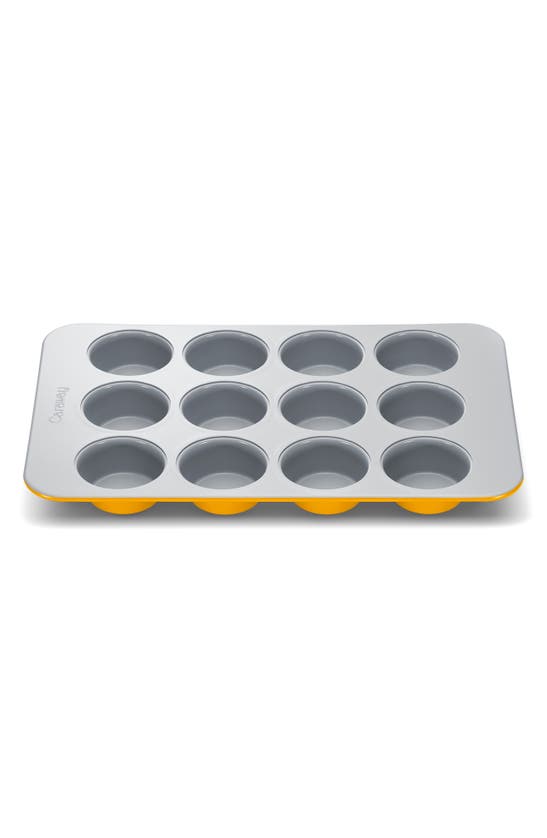 Shop Caraway Nonstick Ceramic Muffin Pan In Marigold