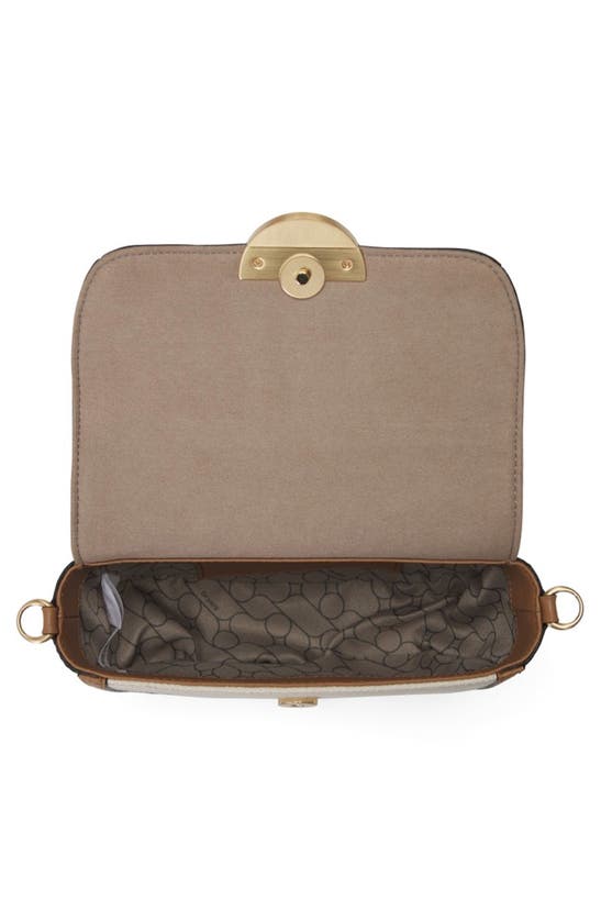 Oryany Lottie Saddle Canvas Crossbody Bag In Sand Brown