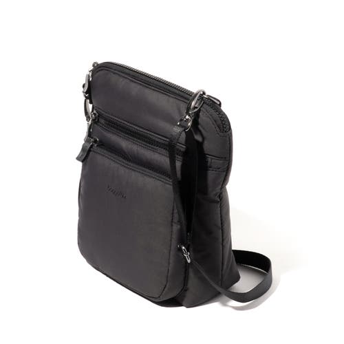 Shop Baggallini Modern Pocket Crossbody Bag In Black Puff