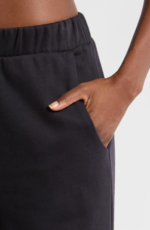 Shop Beyond Yoga Open Ended Mid Rise Wide Leg Pants In Black