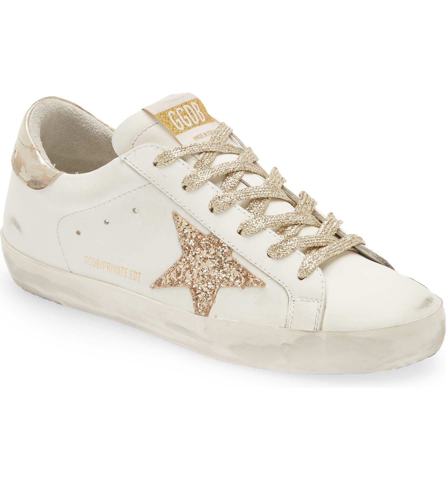 White and gold Golden Goose Super Star sneakers with glitter