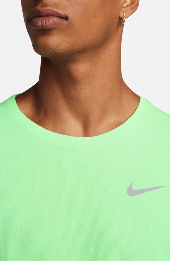 Shop Nike Dri-fit Uv Miler Short Sleeve Running Top In Vapor Green/ Reflective Silver