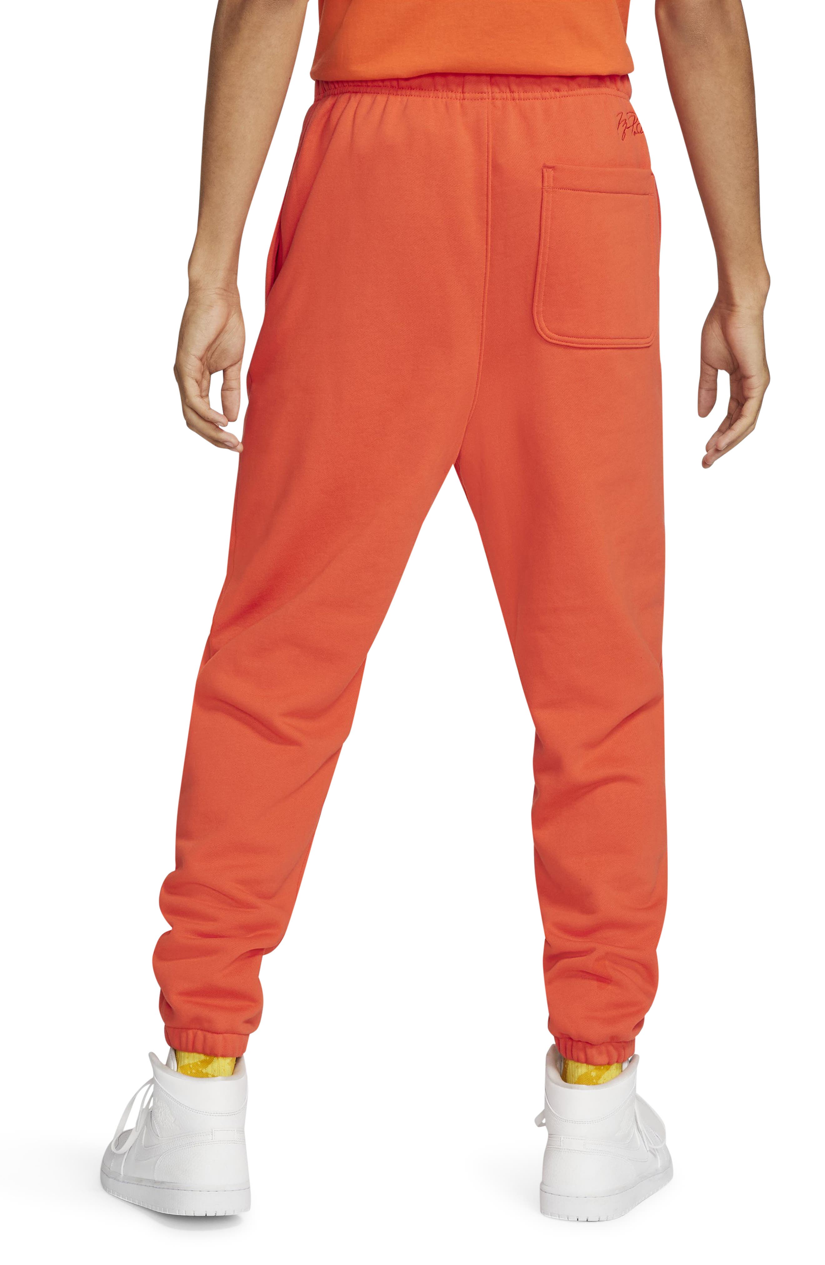 orange jordan joggers