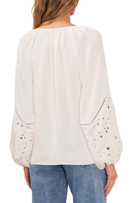 Vince Camuto Eyelet Accent Split Neck Top In Ultra White