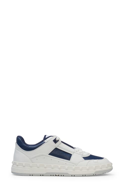 Shop Valentino Garavani Rockstud Low Top Sneaker In Fc6 - Bianco/worker