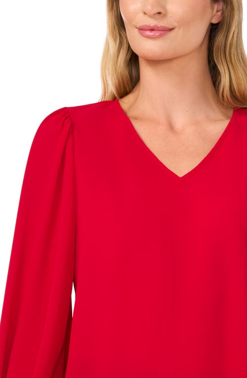 Shop Cece Smocked Cuff V-neck Top In Glamour Red