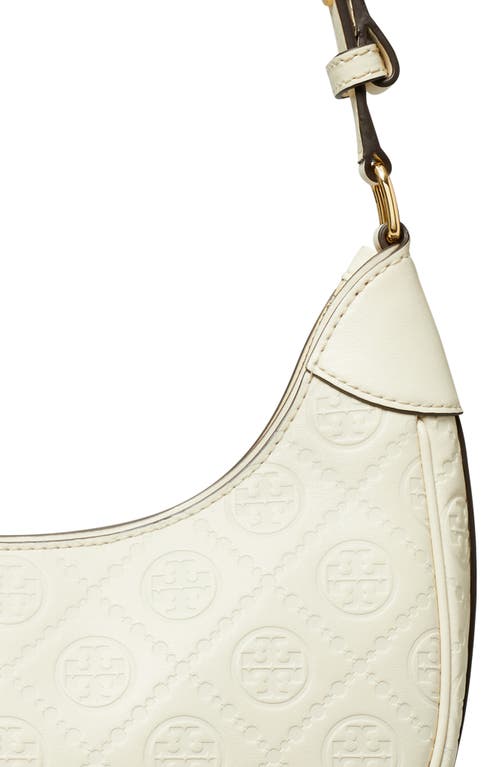 Shop Tory Burch T-monogram Embossed Crescent Shoulder Bag In Light Cream